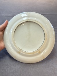 Three Chinese Canton famille verte plates and two famille rose wall pocket vases, 19th C.
