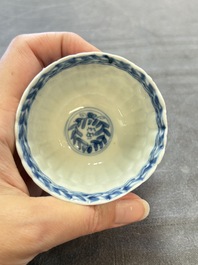 A set of six Chinese blue and white cups and saucers with floral design, Kangxi