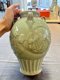 A Chinese Longquan celadon vase with floral design, Ming