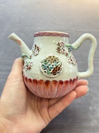 A group of five Chinese famille rose teapots and covers and three stands, Yongzheng/Qianlong
