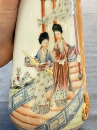 A Chinese famille rose vase with ladies in a garden, Qianlong mark, 19/20th C.