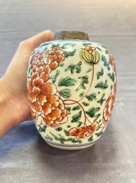 Five Chinese wucai 'Buddhist lion' and 'peony scroll' jars, Transitional period