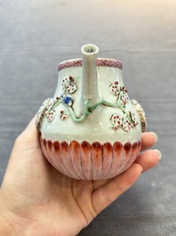 A group of five Chinese famille rose teapots and covers and three stands, Yongzheng/Qianlong