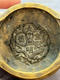 Two Chinese bronze tripod censers, Xuande marks, 19th C.