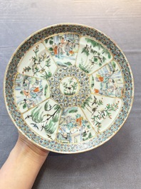 Three Chinese Canton famille verte plates and two famille rose wall pocket vases, 19th C.
