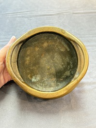 A Chinese bronze tripod censer, Xuande mark, 18th C.