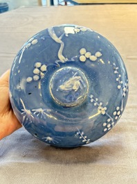 A rare Chinese Swatow white slip-decorated blue-ground bowl and cover, Ming