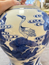 A Chinese blue and white 'He Lu Tong Chun 鶴鹿同春' vase and a wooden cover, Kangxi