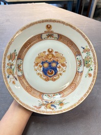 Four Chinese famille rose armorial plates and a dish, Qianlong
