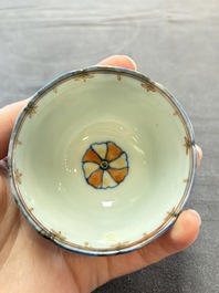 Eleven Chinese famille rose cups and nine saucers, Yongzheng/Qianlong