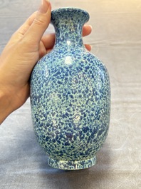 A Chinese white-glazed garlic-head vase and a robin&rsquo;s egg-glazed vase, Qianlong mark, 20th C.