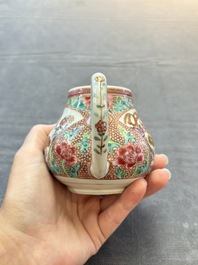 A group of five Chinese famille rose teapots and covers and three stands, Yongzheng/Qianlong