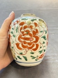 Five Chinese wucai 'Buddhist lion' and 'peony scroll' jars, Transitional period