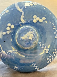 A rare Chinese Swatow white slip-decorated blue-ground bowl and cover, Ming