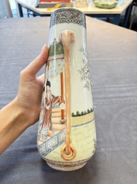 A Chinese famille rose vase with ladies in a garden, Qianlong mark, 19/20th C.