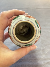 Five Chinese wucai 'Buddhist lion' and 'peony scroll' jars, Transitional period