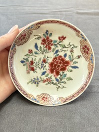 Eleven Chinese famille rose cups and nine saucers, Yongzheng/Qianlong