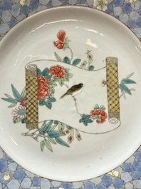 A Chinese famille rose ruby-back plate with a bird on a blossoming branch, Yongzheng