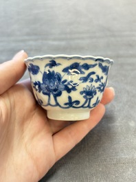 A set of six Chinese blue and white cups and saucers with floral design, Kangxi