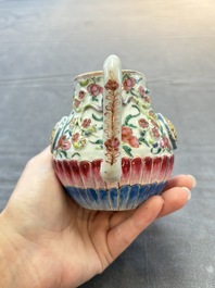 A group of five Chinese famille rose teapots and covers and three stands, Yongzheng/Qianlong