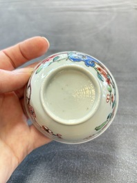 Eleven Chinese famille rose cups and nine saucers, Yongzheng/Qianlong