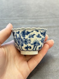 A set of six Chinese blue and white cups and saucers with floral design, Kangxi