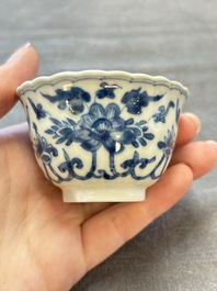 A set of six Chinese blue and white cups and saucers with floral design, Kangxi