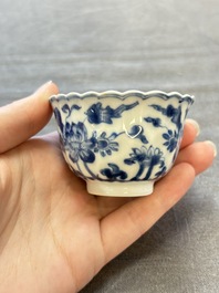 A set of six Chinese blue and white cups and saucers with floral design, Kangxi
