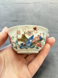 Eleven Chinese famille rose cups and nine saucers, Yongzheng/Qianlong