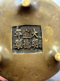 Two Chinese bronze tripod censers, Xuande marks, 19th C.