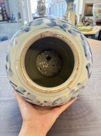 A Chinese blue and white 'dragon' vase, Transitional period
