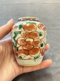 Five Chinese wucai 'Buddhist lion' and 'peony scroll' jars, Transitional period