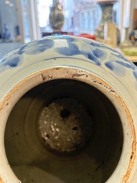 A Chinese blue and white 'dragon' vase, Transitional period