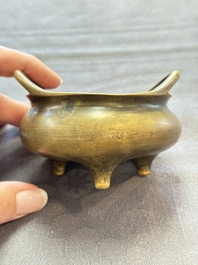 Two Chinese bronze tripod censers, Xuande marks, 19th C.