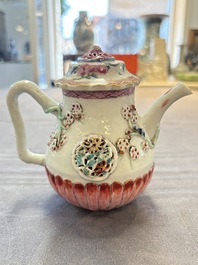 A group of five Chinese famille rose teapots and covers and three stands, Yongzheng/Qianlong