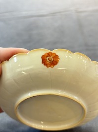 A Chinese famille verte bowl and saucer with floral design, Kangxi