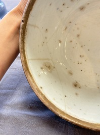 A rare Chinese Swatow white slip-decorated blue-ground bowl and cover, Ming