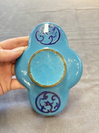 A pair of Chinese blue-ground Canton enamel covered bowls on stands and an egg cup, Qianlong/Jiaqing