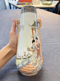 A Chinese famille rose vase with ladies in a garden, Qianlong mark, 19/20th C.