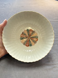 A Chinese famille verte bowl and saucer with floral design, Kangxi