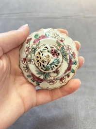 A group of five Chinese famille rose teapots and covers and three stands, Yongzheng/Qianlong