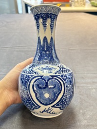 A Chinese blue and white vase with floral design, 19th C.