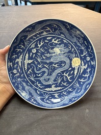 A Chinese blue and white 'dragon' dish, Daoguang mark and period