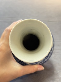 A Chinese blue and white vase with floral design, 19th C.