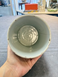 A Chinese wucai 'gu' vase and a blue and white brush pot, Transitional period and later