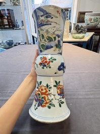 A Chinese wucai 'gu' vase and a blue and white brush pot, Transitional period and later