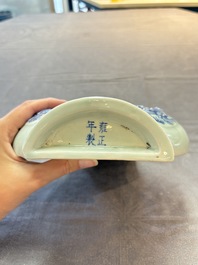 A pair of Chinese blue and white celadon-ground 'Buddhist lions' wall pocket vases, Yongzheng mark, 19/20th C.