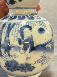 A Chinese blue and white 'playing boys' double gourd vase, Transitional period