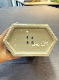 A pair of Chinese blue and white tea caddies and covers, 19th C.