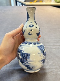 A Chinese blue and white 'playing boys' double gourd vase, Transitional period